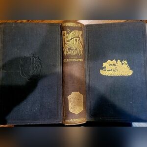 Antique edition of the book Roughing It by Mark Twain, published by the American